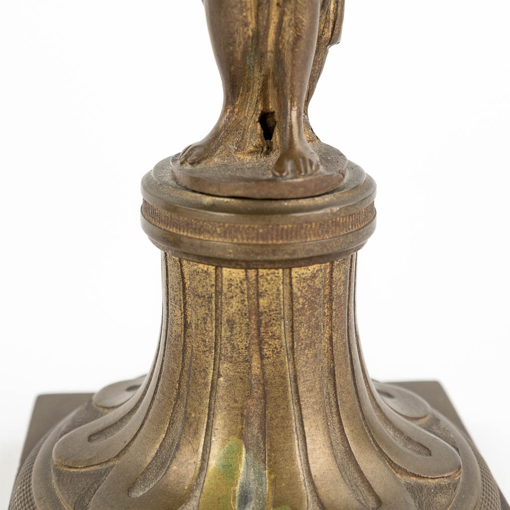A pair of Karyatid candlesticks, bronze 19th C. (L: 8 x W: 8 x H: 24 cm)