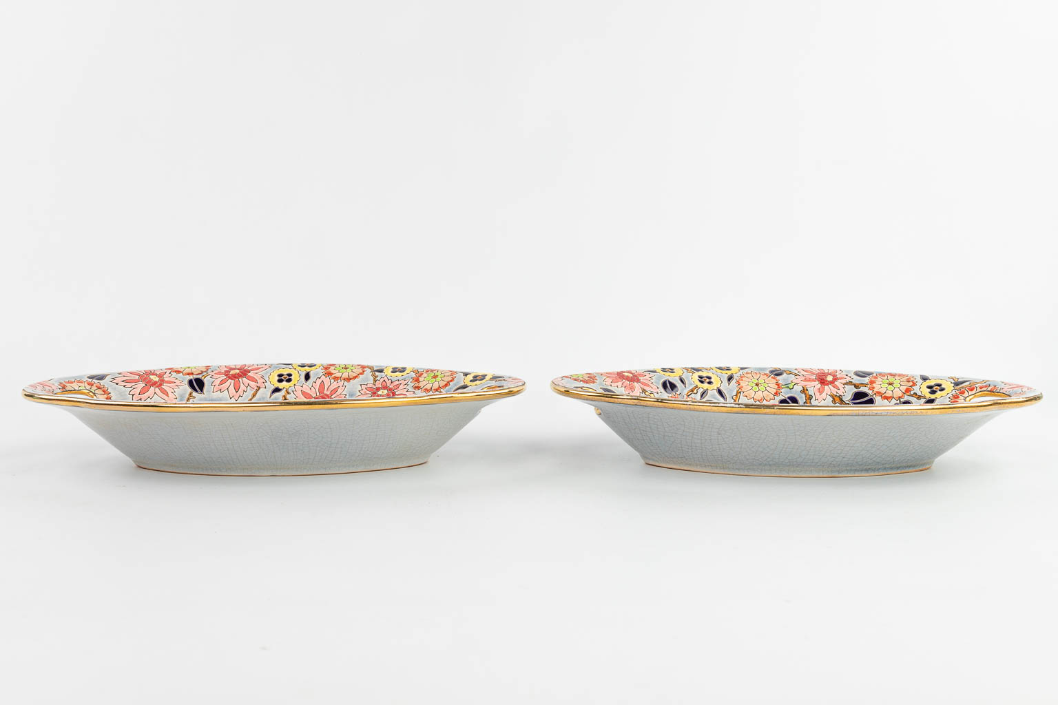 A collection of 15 items made of ceramics by Longwy and in the style of Longwy. 
