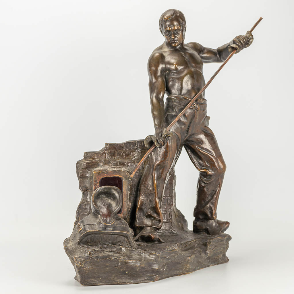 Julius Robert HANNIG (1866-1931) 'The Foundry' A terra-cotta statue. 