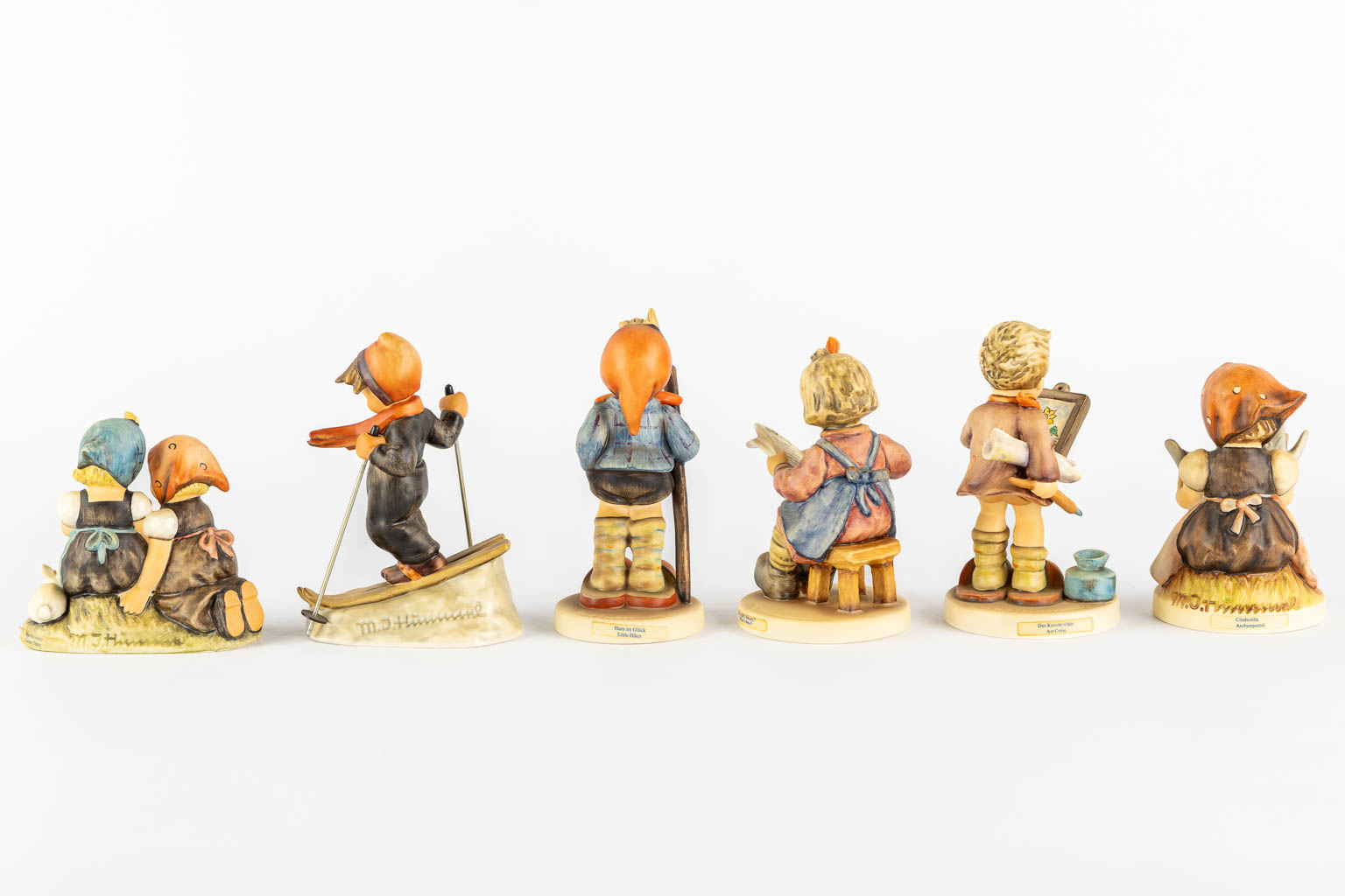 Hummel, 12 figurines, polychrome porcelain. (H:20,5 cm)