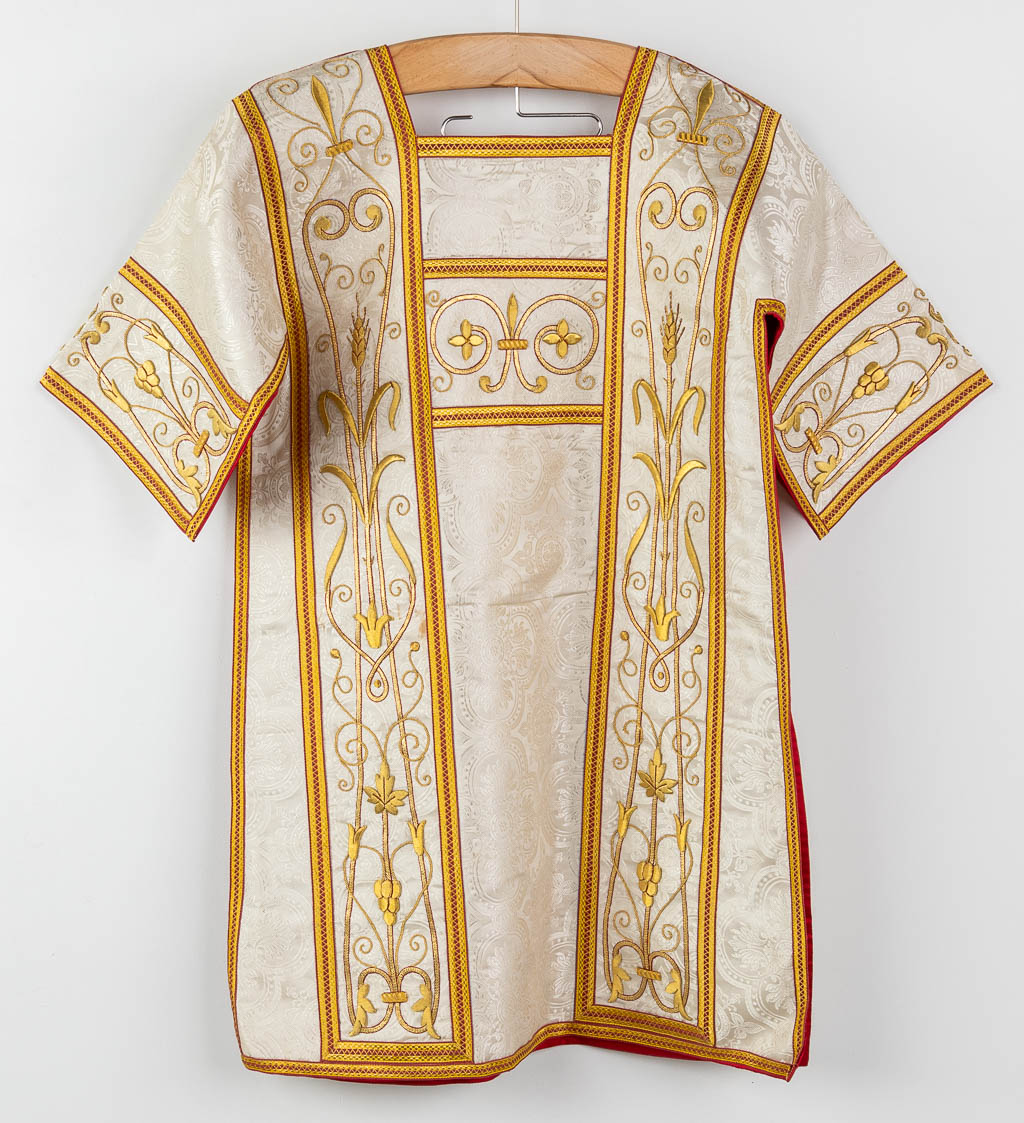 A matching set of Liturgical robes, 4 dalmatics, maniples and stola.