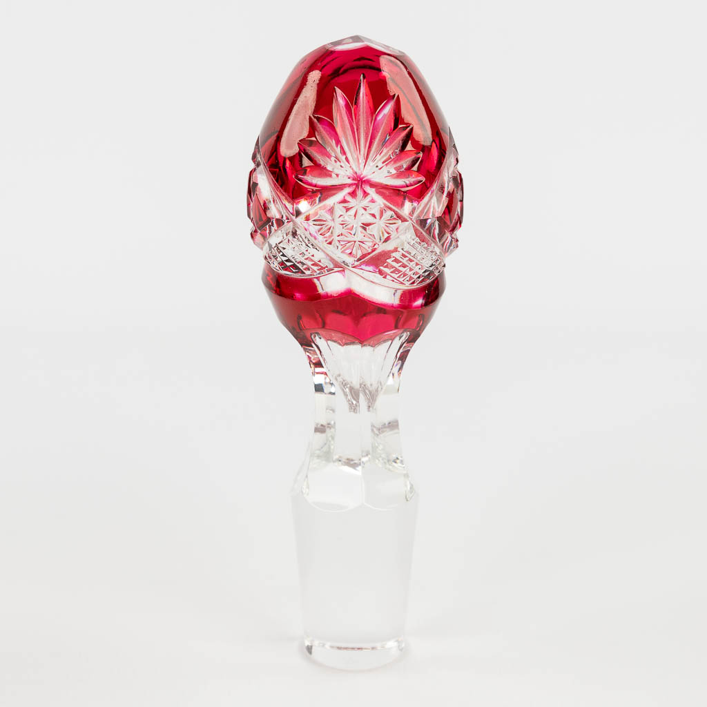 Val Saint Lambert, Berncastel, a collection of 6 coloured and cut crystal glasses with a carafe. (H: 41 cm)