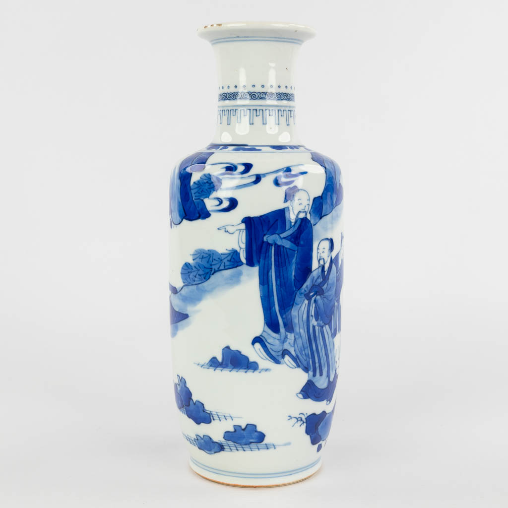 A Chinese vase decorated with blue-white figurines, 18th/19th C. (D:10,5 x W:10,5 x H:26 cm)