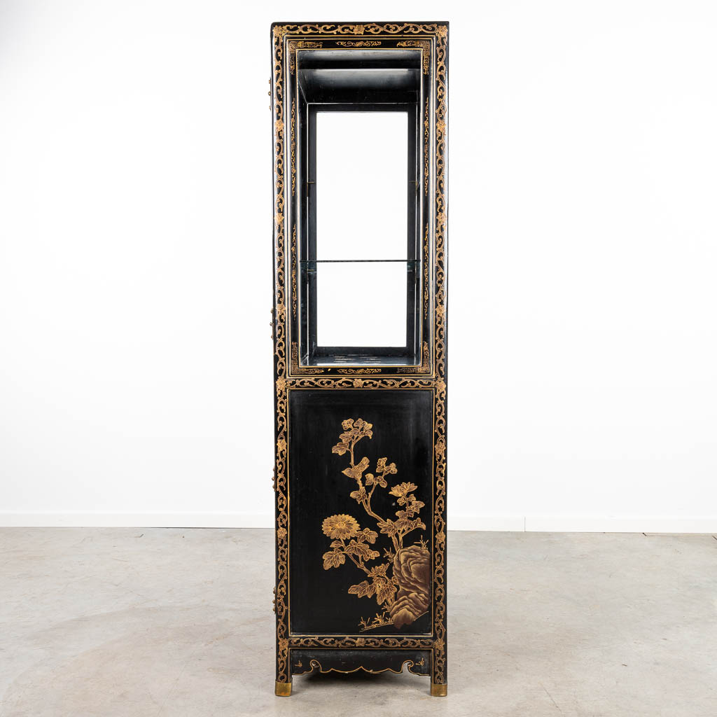A Chinese display cabinet in Oriental style and finished with hardstone. (H:148cm)