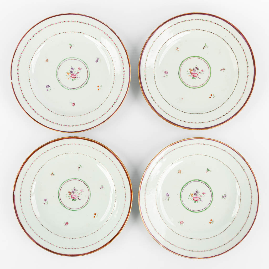 Ten Chinese Famille Rose plates and cups, flower decor. (D:23,5 cm)