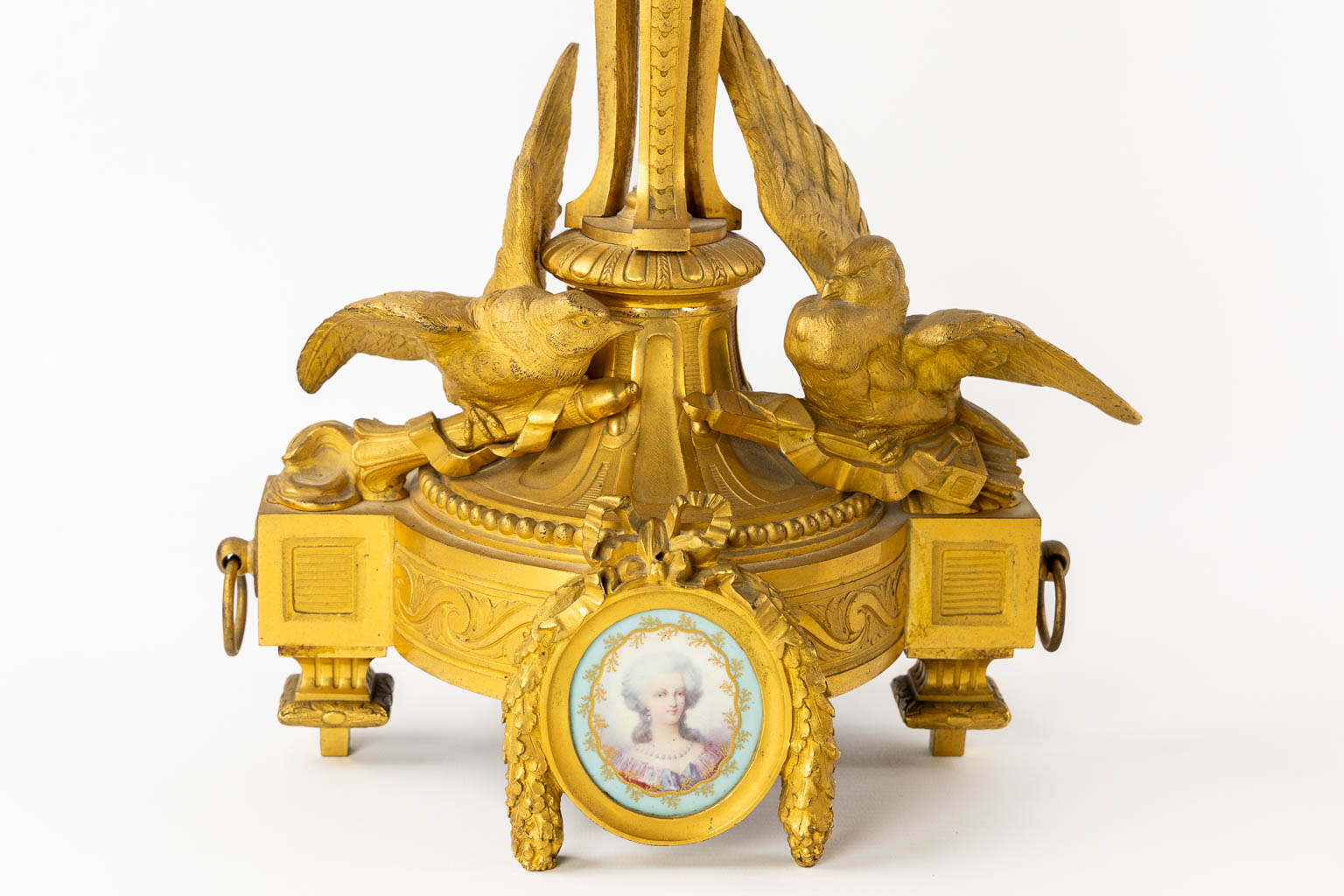 Lerolle Paris, a three-piece mantle garniture clock and candelabra, gilt bronze. France, 19th C. (L:26 x W:70 x H:65 cm)
