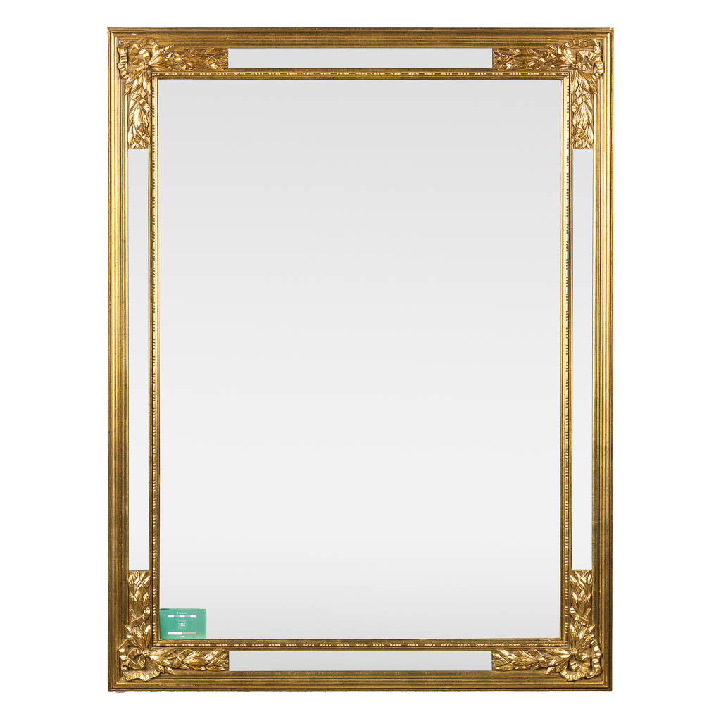 Deknudt, twee rechthoekige spiegels. Verguld hout. (W:128 x H:90 cm)