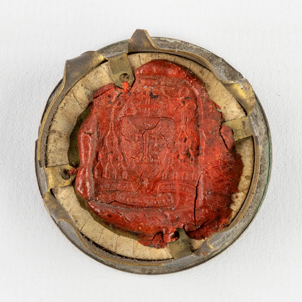 A sealed theca with a relic: Ex Ossibus Sancti Columbani abbatis