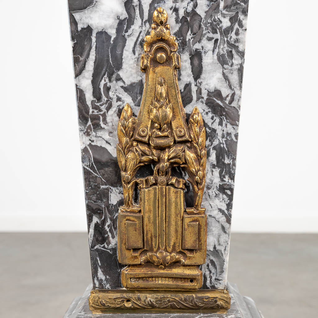 A pedestal, made of grey marble mounted with gilt bronze. (L:30 x W:30 x H:104 cm)