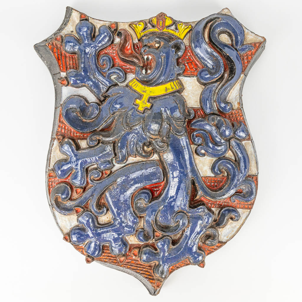 A large glazed terracotta coat of arms, 'The Lion of Bruges'. Marked Karel
