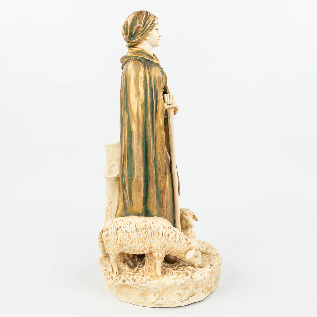 Een beeld van een schaapherderin gemaakt uit faience in art deco stijl, gemerkt door Bernard Bloch (H:46cm)