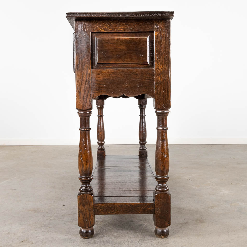 An English console table with 3 drawers. 20th C. (D:35 x W:120 x H:77 cm)