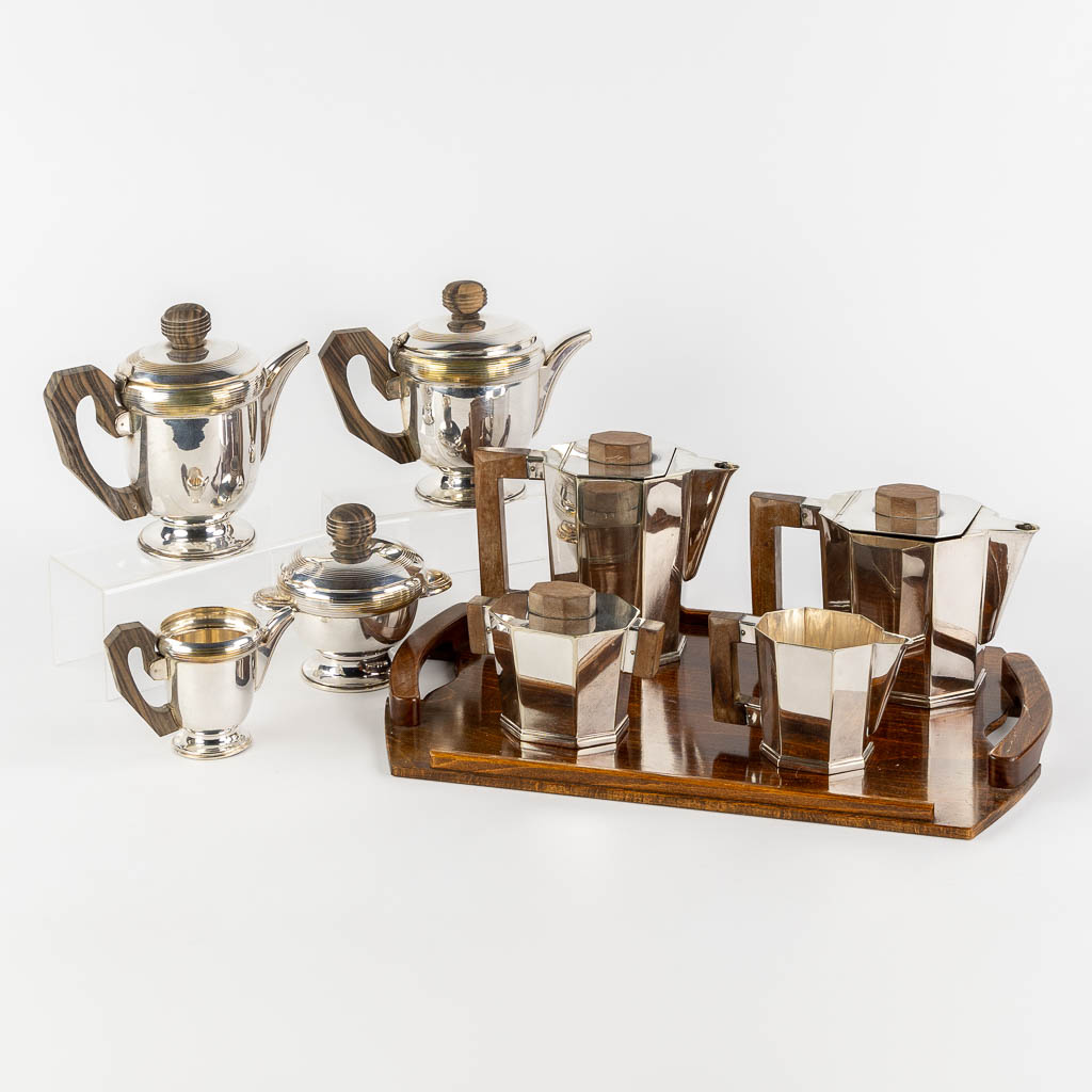 Lot 018 Two silver-plated coffee and tea services, Art Deco. (L:31 x W:49 cm)
