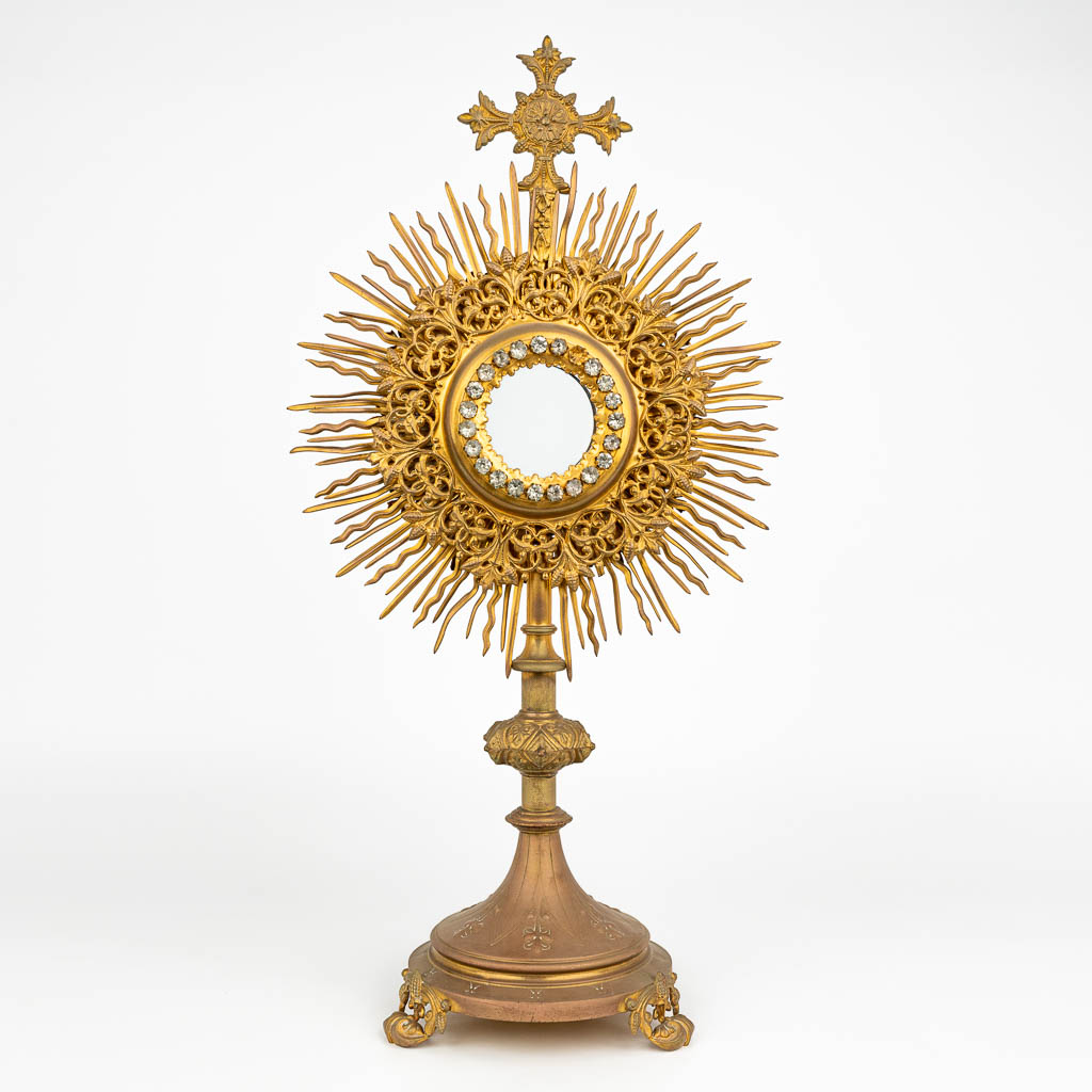 A traditional solar monstrance made of brass with cut glass decoration. (H:50cm)