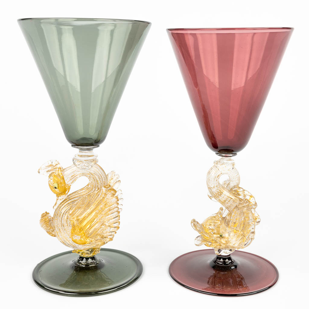 A pair of Venetian Goblets with a stem of a swan and fish, marked Venini, Murano. Made in Italy. (H:20,5cm)