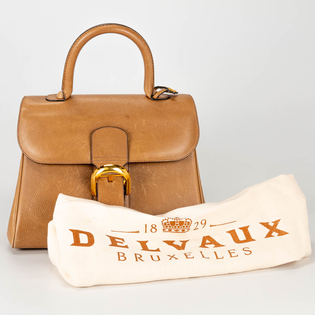 Een handtas gemaakt uit bruin leder en gemerkt Delvaux, model Brilliant