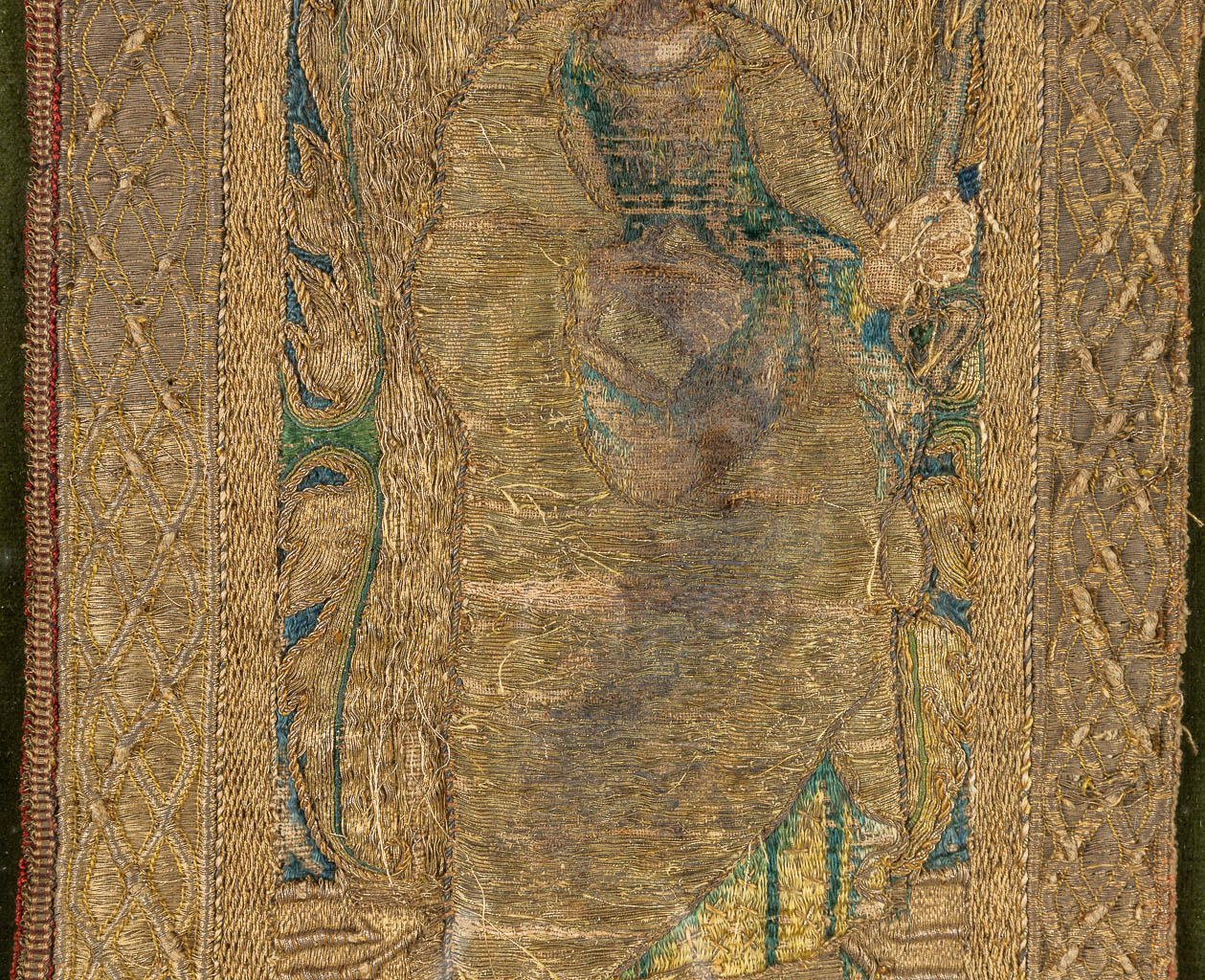 A fragment of a Chasuble with an embroidered image of Jacobus Minor. The first half of the 16th century. (H:50cm)