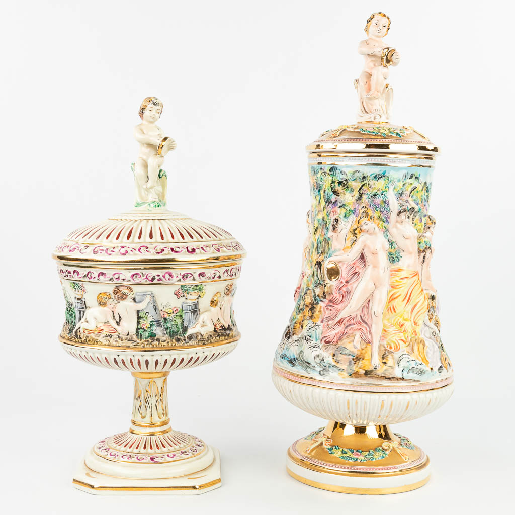 An assembled lot of 9 pieces of faience made by Capodimonte in Italy. (H:60cm)