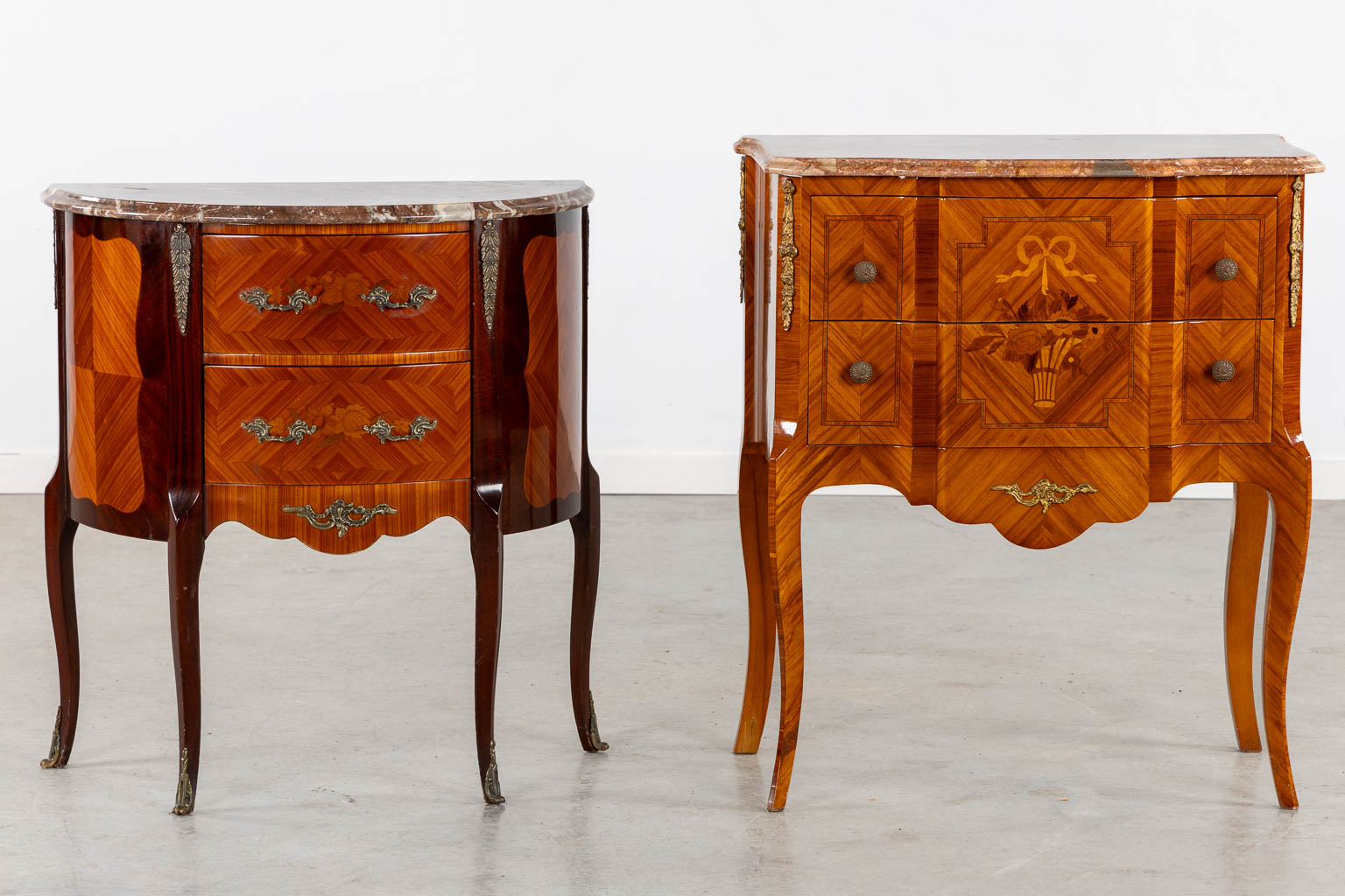Two small cabinets with drawers, marquetry inlay and a marble top. 20th C. (L:39 x W:70 x H:80 cm)