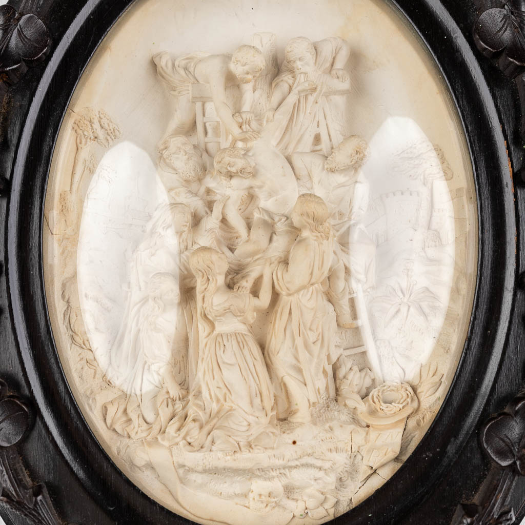 4 kaders, religieuze afbeeldingen in pijpaarde. Jezus Christus, Corpus Christi, Kruisafname. (W:43 x H:52 cm)