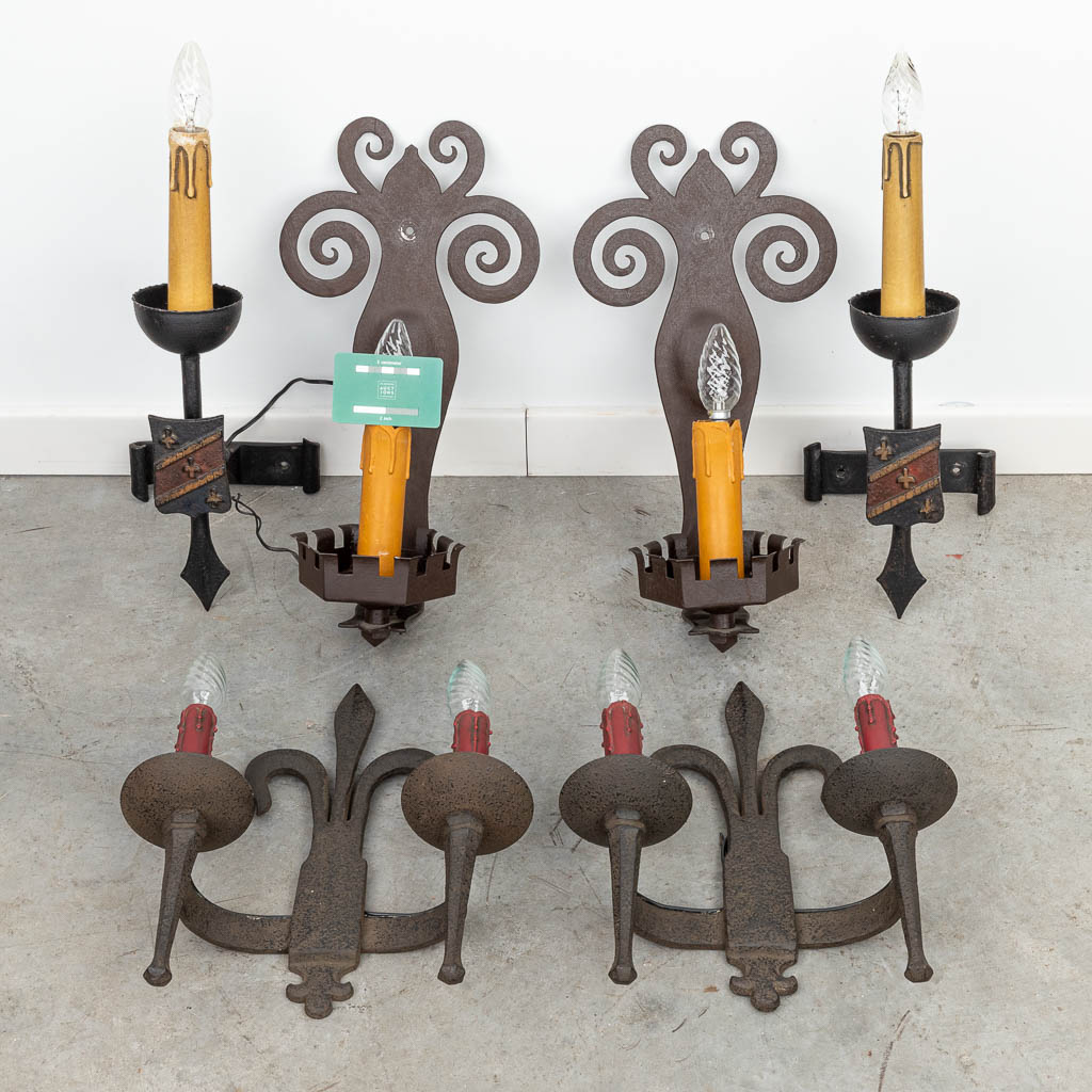 A collection of 6 wall lamps made of wrought iron. (H:40cm)