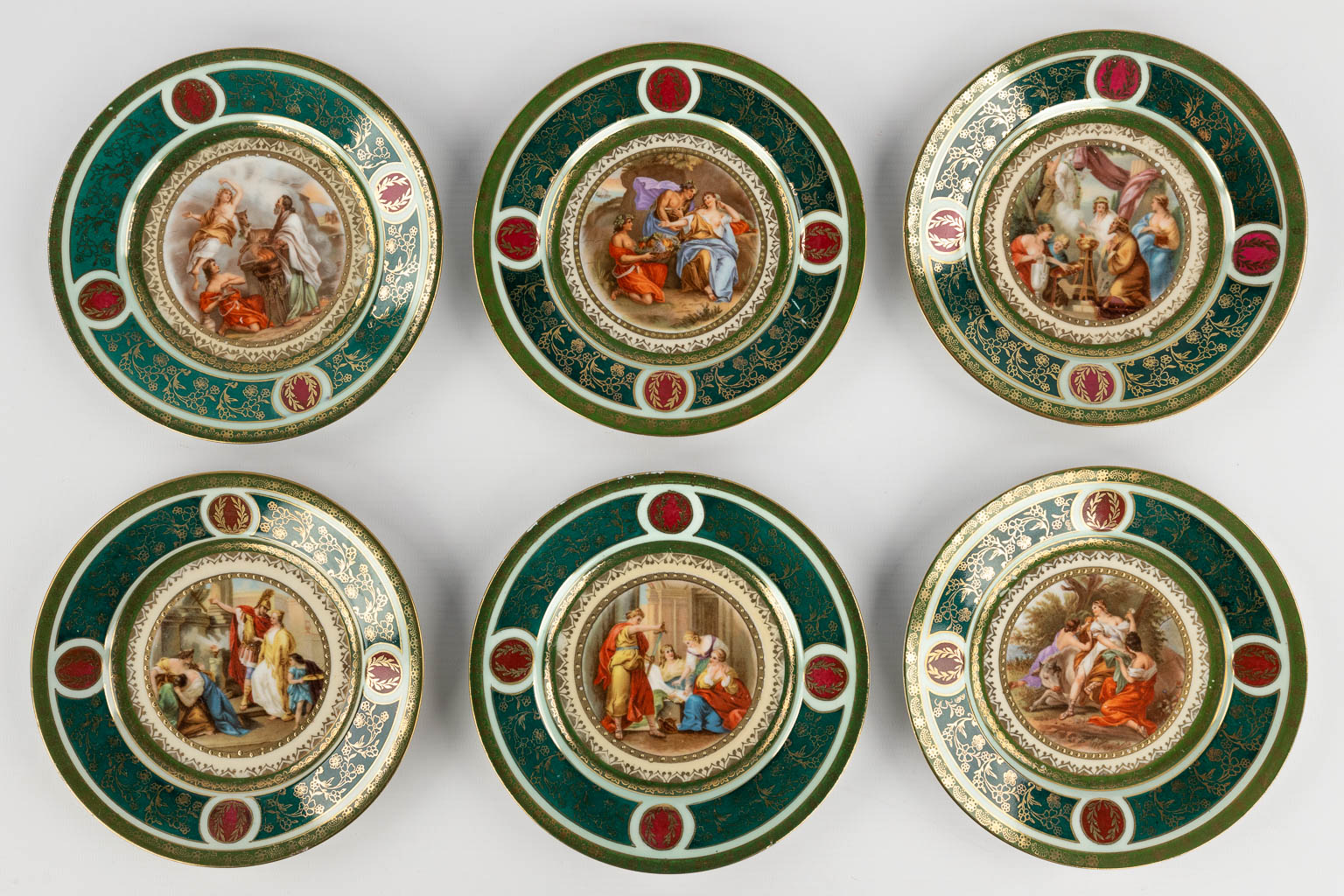 Vienna Porcelain, a set of 9 plates with printed decor. 20th C. (D:25 x W:27 cm)