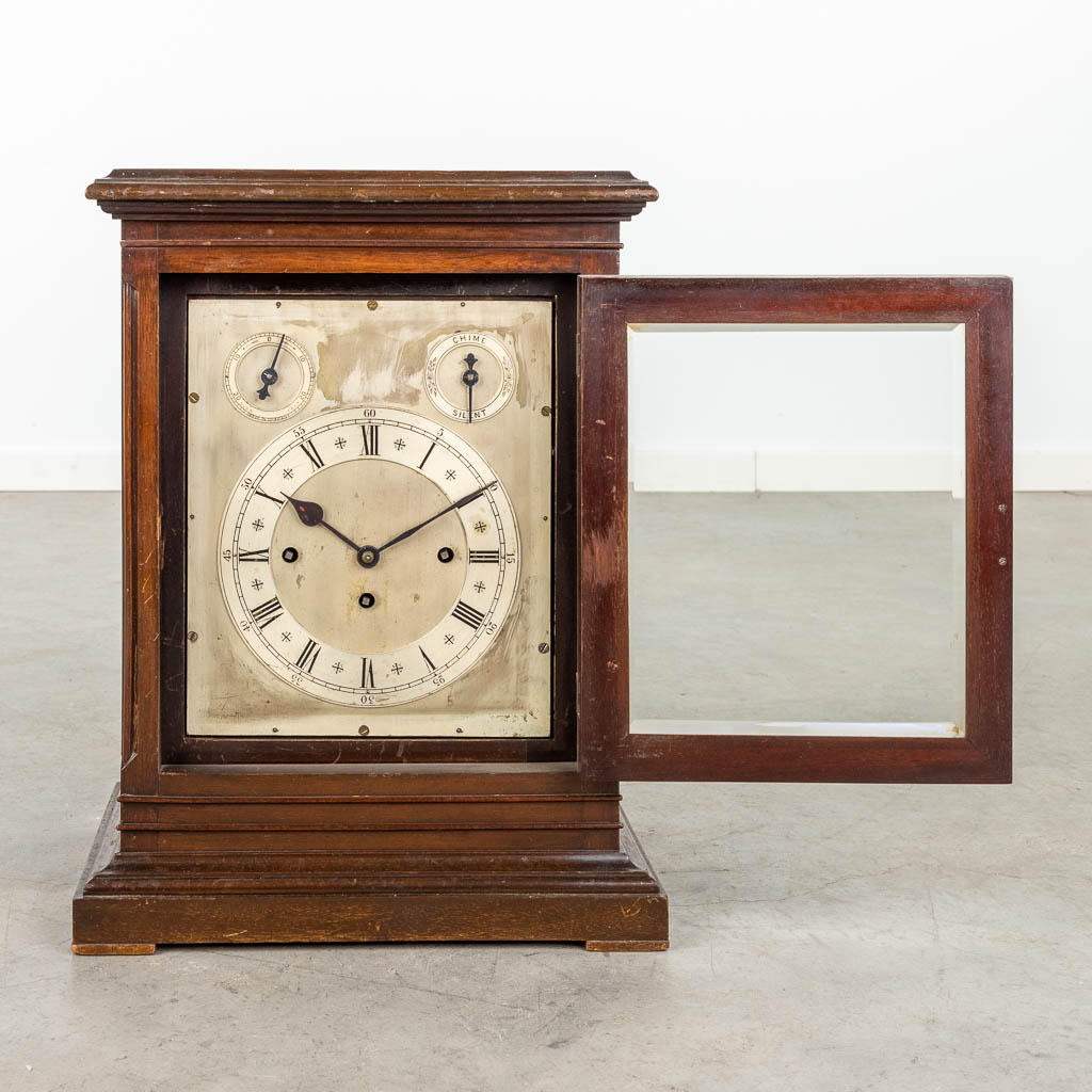 An antique English table clock with 3 gongs. Silver-plated dial and Snek movement. 19th C. (D:25 x W:36 x H:48 cm)