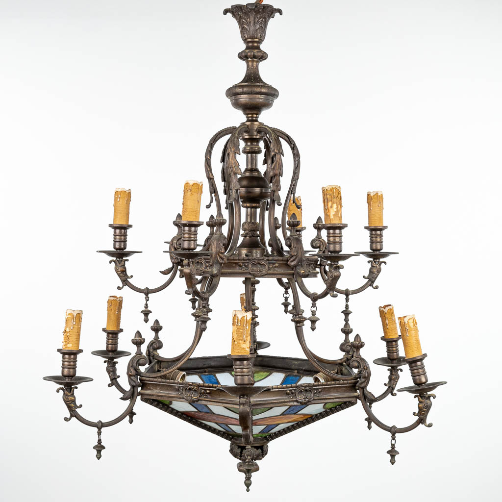 A large double chandelier made of bronze and finished with stained glass. (H:105cm)
