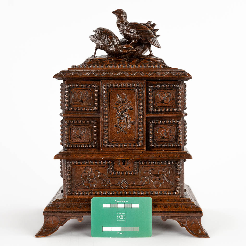 A jewelry box, sculptured wood, decor of birds and flowers, black forest. (D:16 x W:24 x H:32 cm)