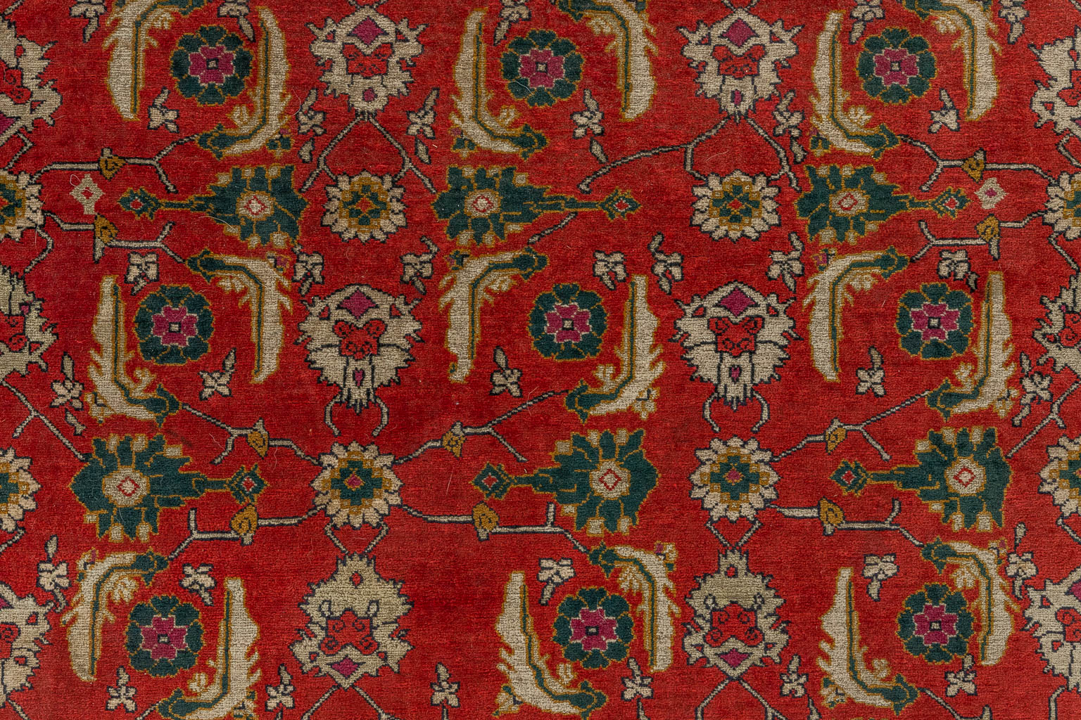 An Oriental hand-made carpet, Persian. (D:173 x W:128 cm)