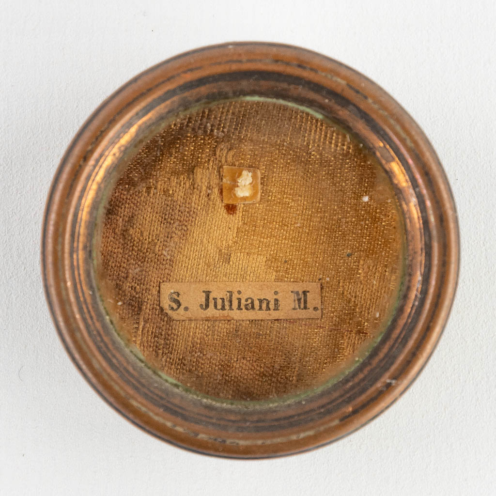 A sealed theca with a relic: Ex oosibus Sancti Juliani M.