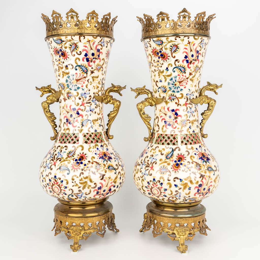 A pair of bronze mounted faience vases marked J. Fischer Budapest, Hungary. (H:54cm)
