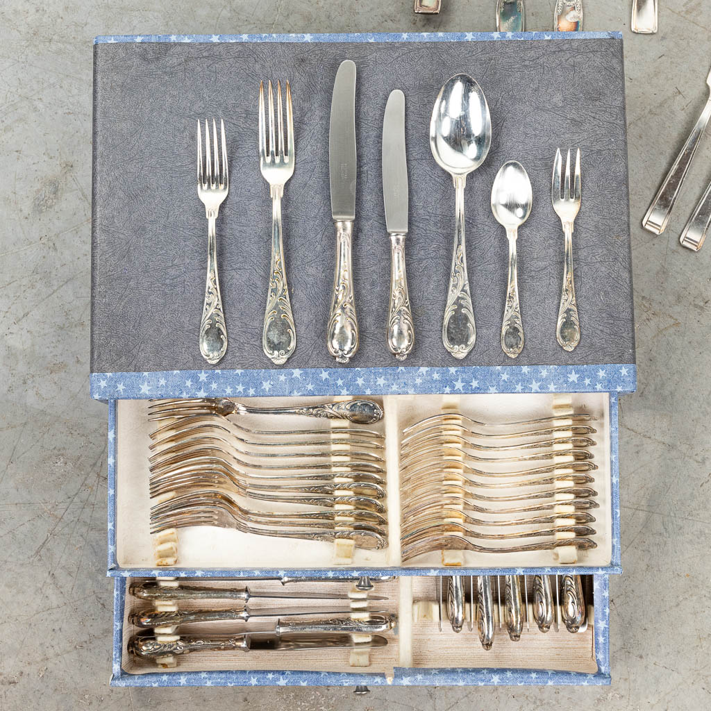 An assembled collection of silver-plated cutlery and accessories. 