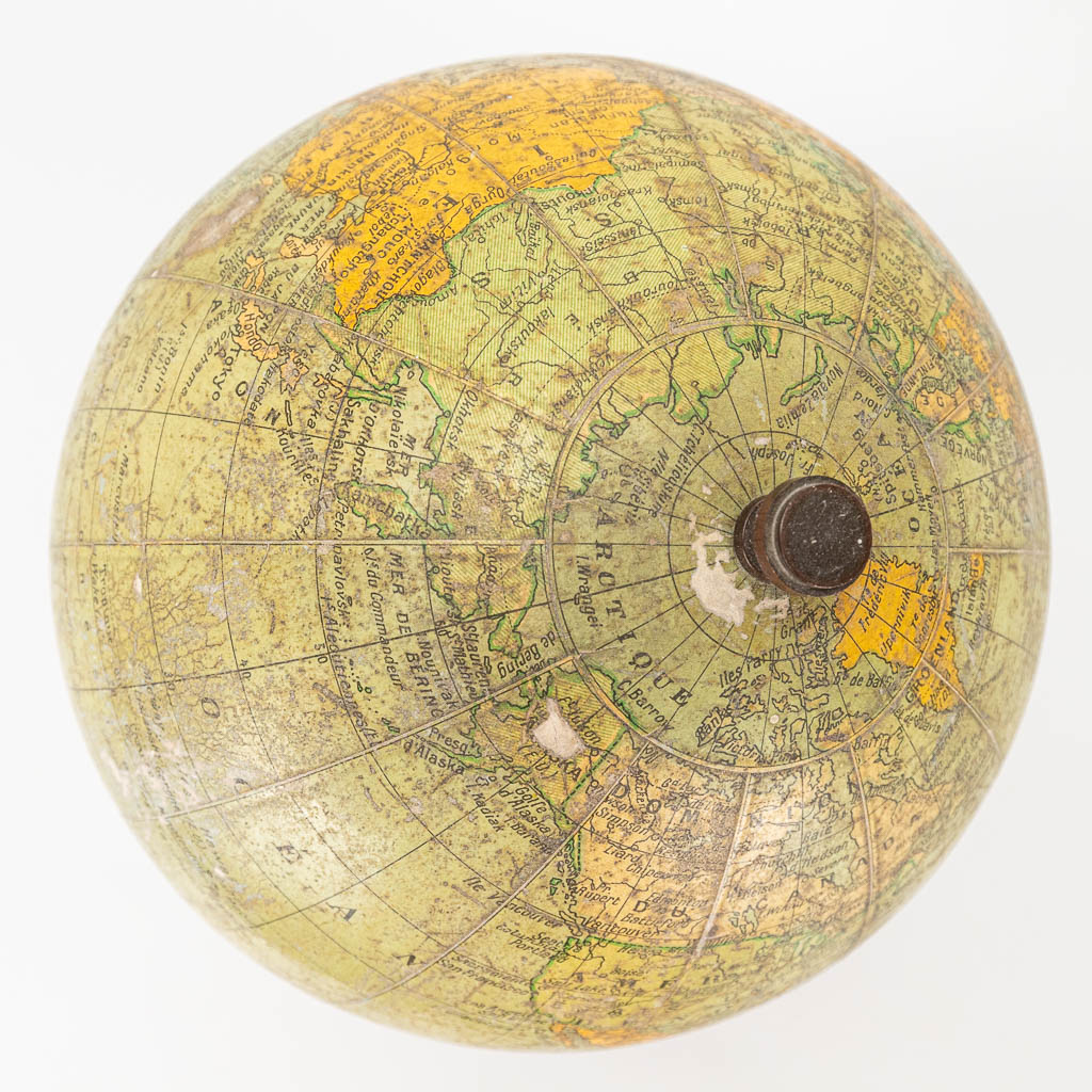 A set of 2 globes marked G. Thomas and Columbus Erdglobus
