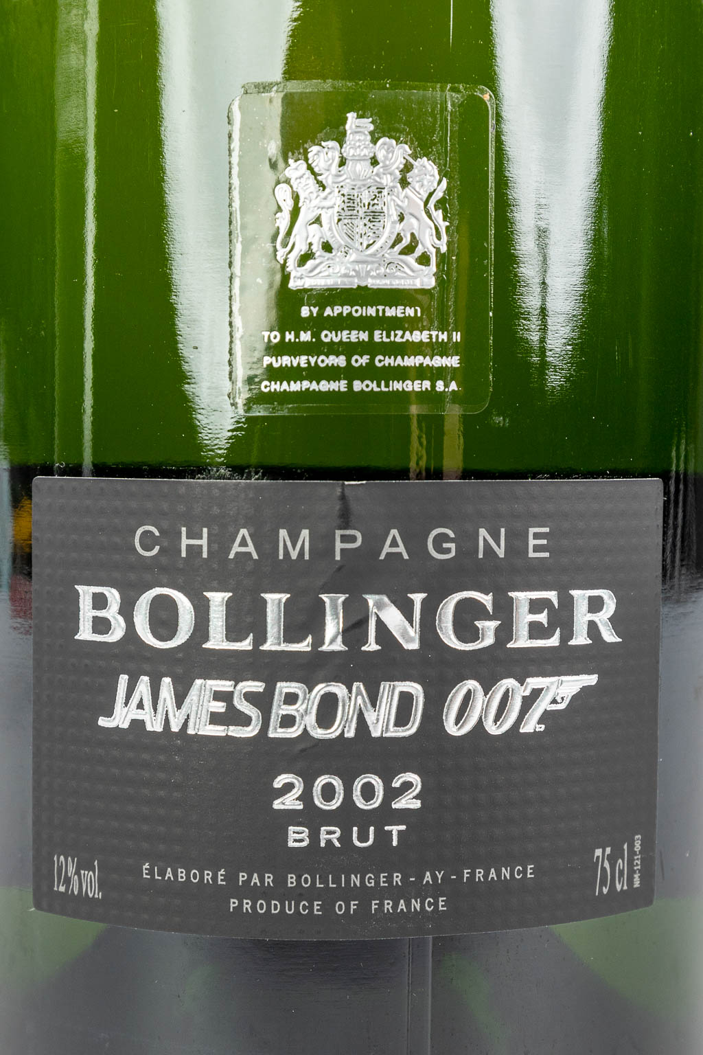 A bottle of Bollinger Champagne in a silencer container, special edition for James Bond, 2002. (H:33cm)