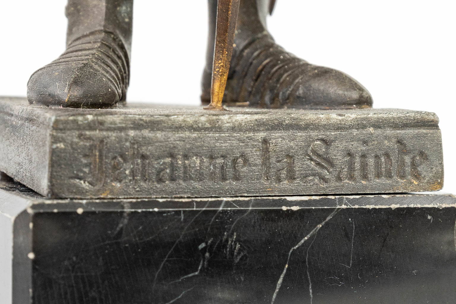 A Chryselephantine spelter statue of Jeanne D'arc marked 'Jeanne La Sainte'. (H:25cm)