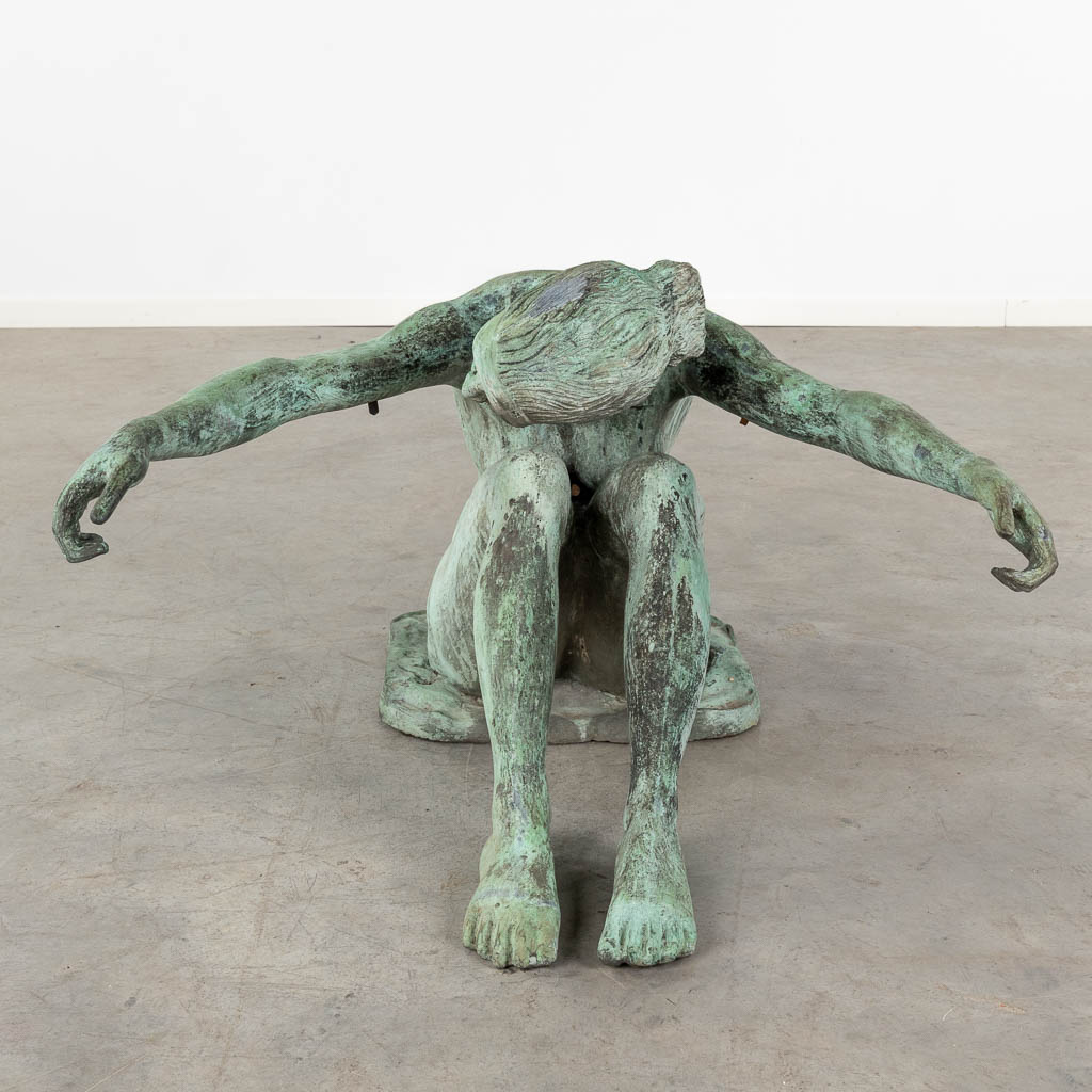 A base for a coffee table, shape of a figurine, patinated bronze. 20th C. (D:82 x W:87 x H:55 cm)