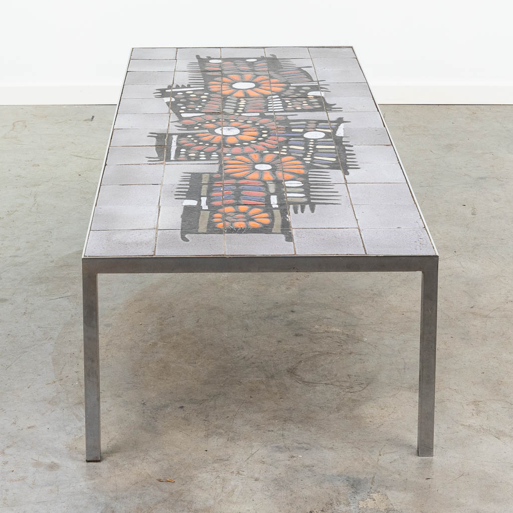 A coffee table made of ceramics on a chrome base and made by Perignem in Beernem. (H:38cm)
