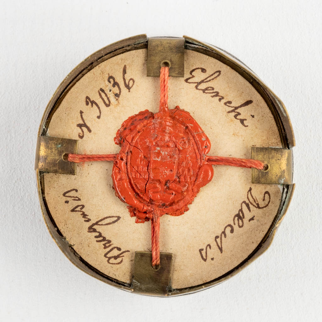 A sealed theca with a relic: Ex Ossibus Sancti Bernardi Senensins, Sancti Justi Martyr et Beati Hermani José Phi