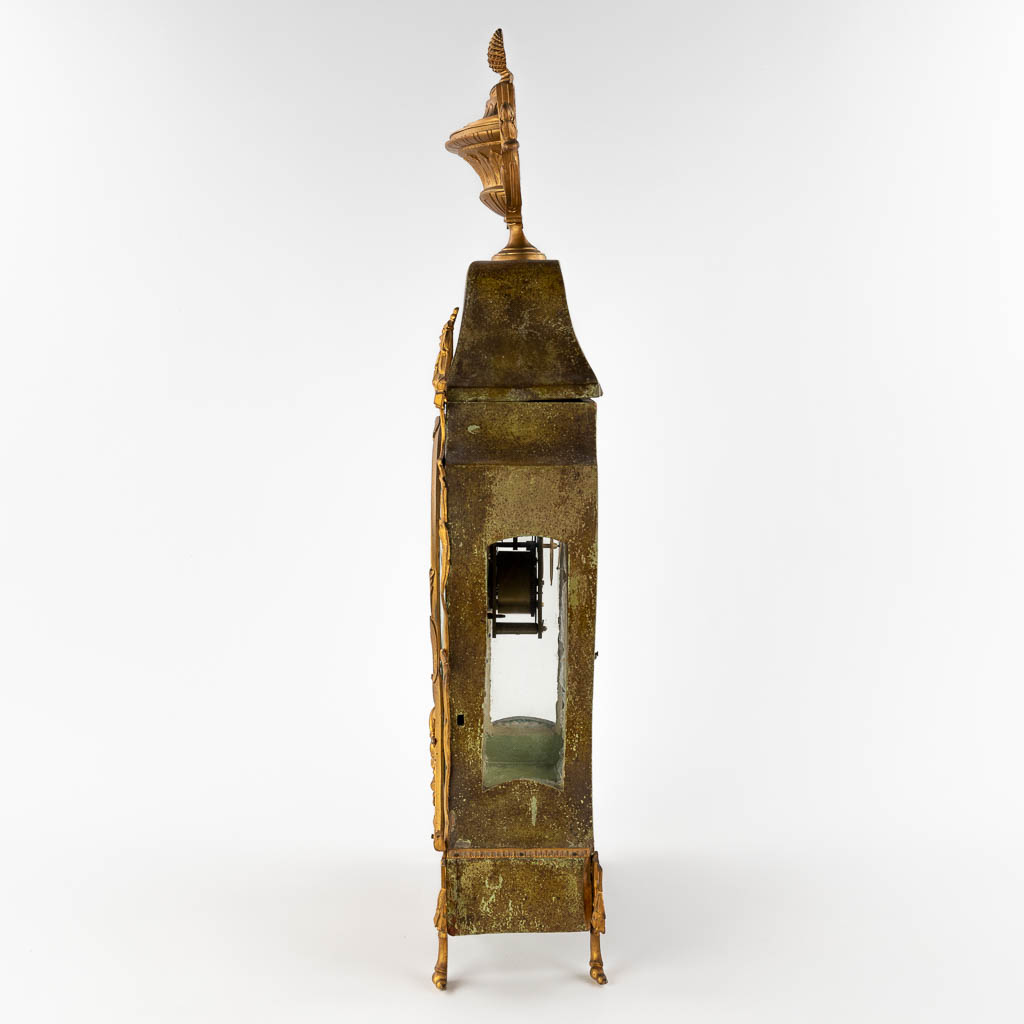 An antique cartel clock, wood mounted with gilt bronze, Louis XVI. (D:14 x W:36 x H:79 cm)