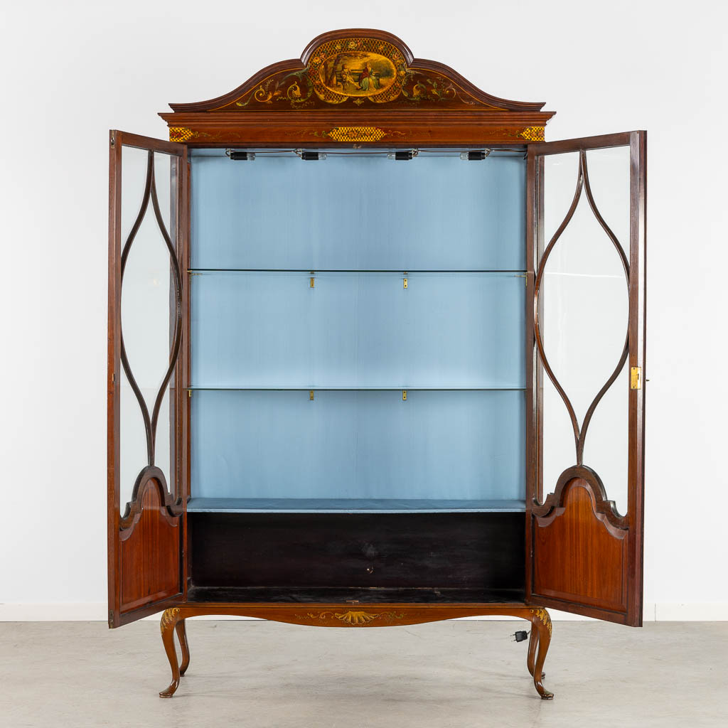 An attractive English display cabinet, hand-painted decors. Circa 1920. (L:39 x W:124 x H:210 cm)