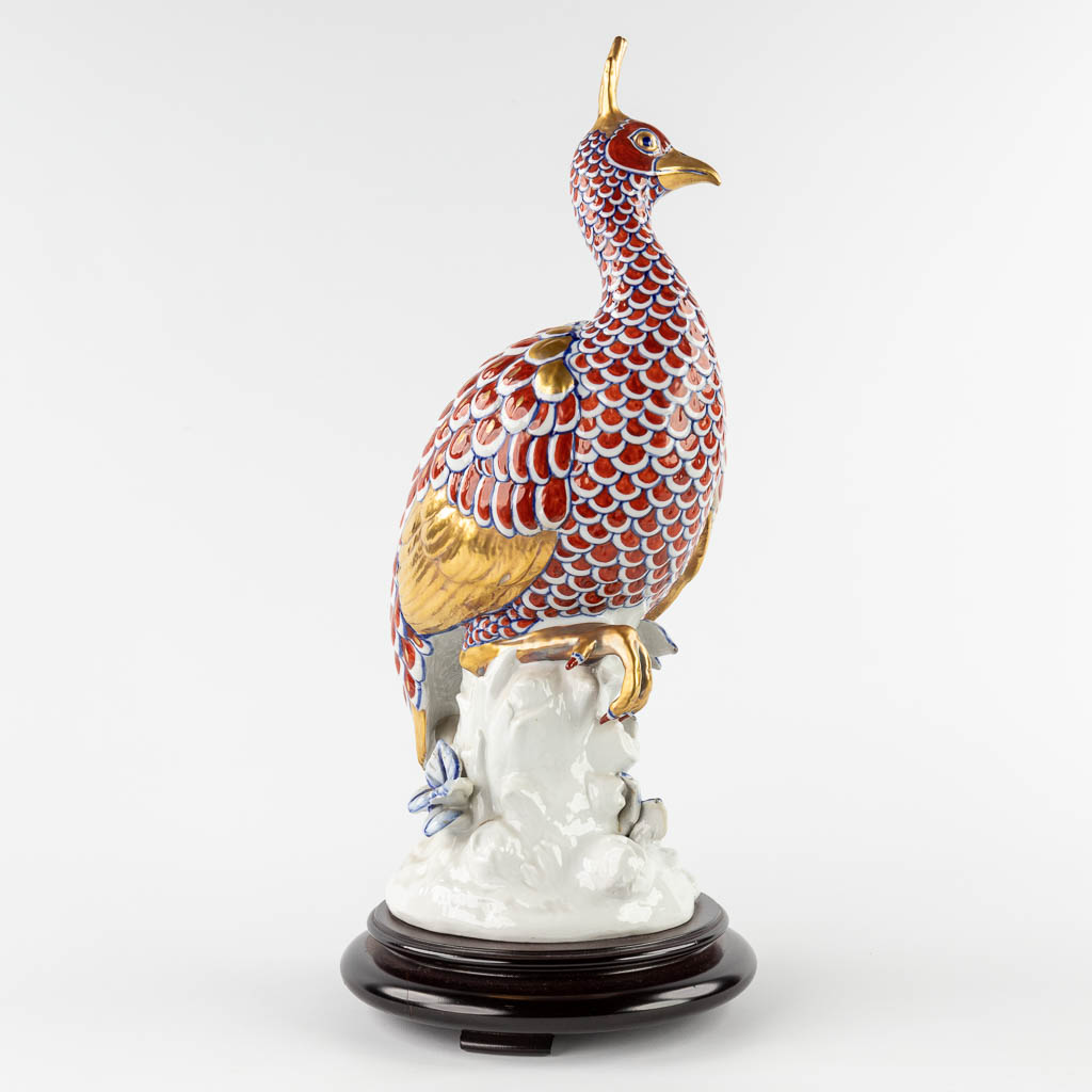 Societa Porcelane Artistice Firenze Italy, a bird, porcelain. (H:51 x D:22 cm)