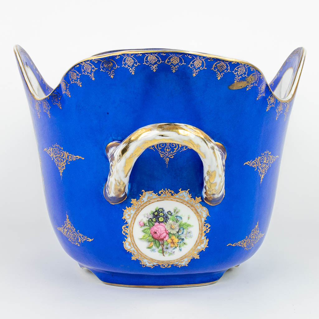 A large wine cooler made of porcelain with flower decor and marked with the Meissener logo. (H:28cm)