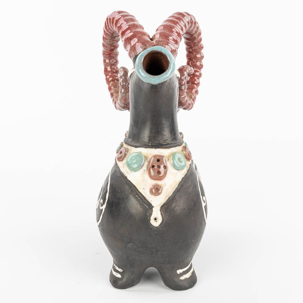 A pitcher in the shape of an Ibex. (H:20,5cm)
