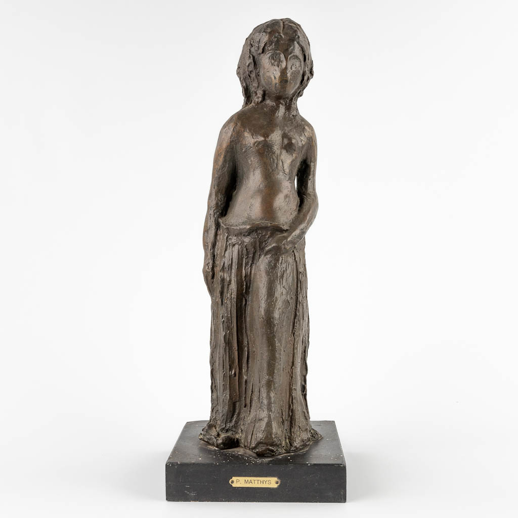 P. MATTHYS (XX) 'Figure of a Girl' patinated bronze. (D:18 x W:18 x H:50 cm)