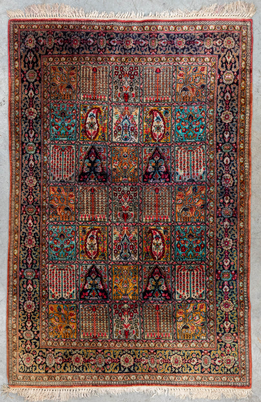 An Oriental hand-made carpet, Ghom Silk (166 x 109 cm) 