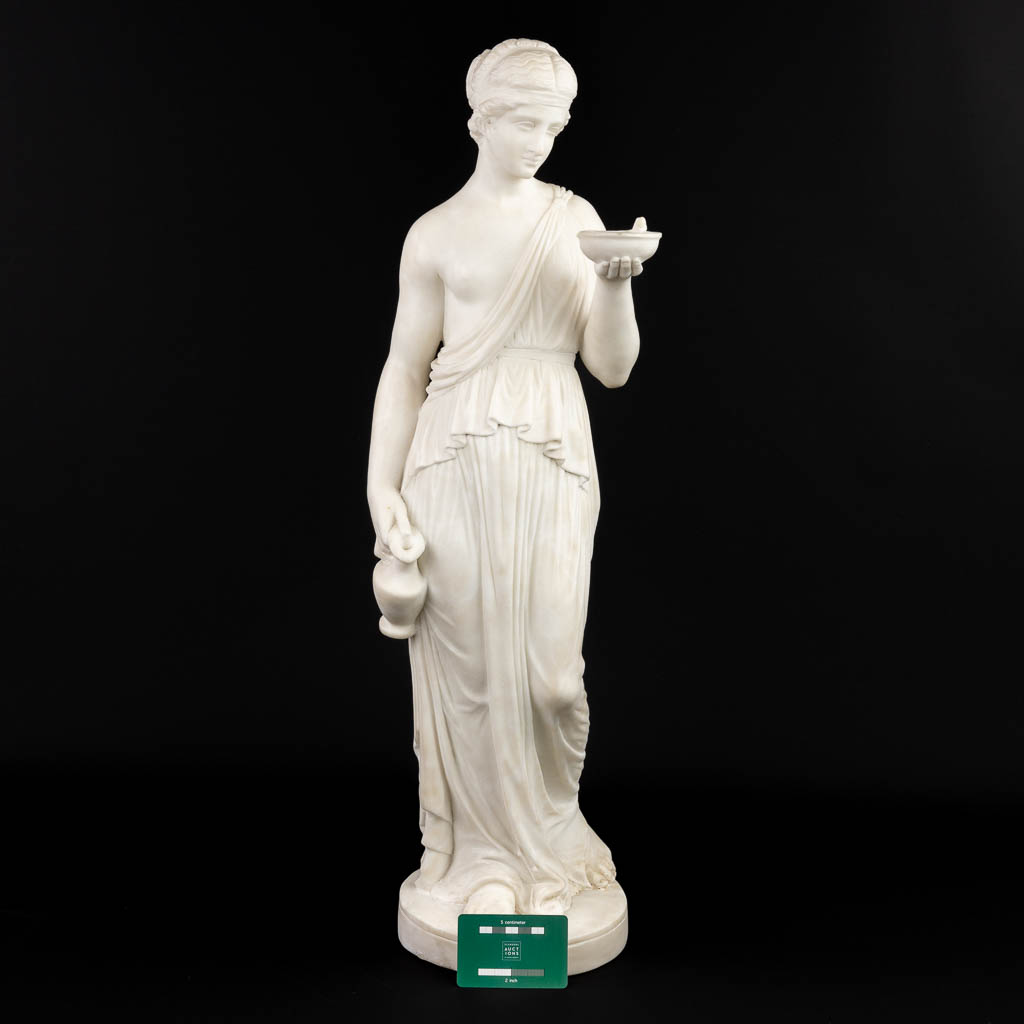 A classical statue of a Greek lady with a jug and bowl, made of sculptured Carrara marble. (H:74cm)
