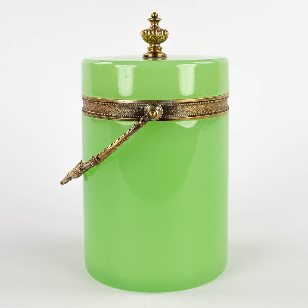 A green storage box, Opaline glass mounted with brass. 20th C. (D:12,5 x W:16 x H:26 cm)