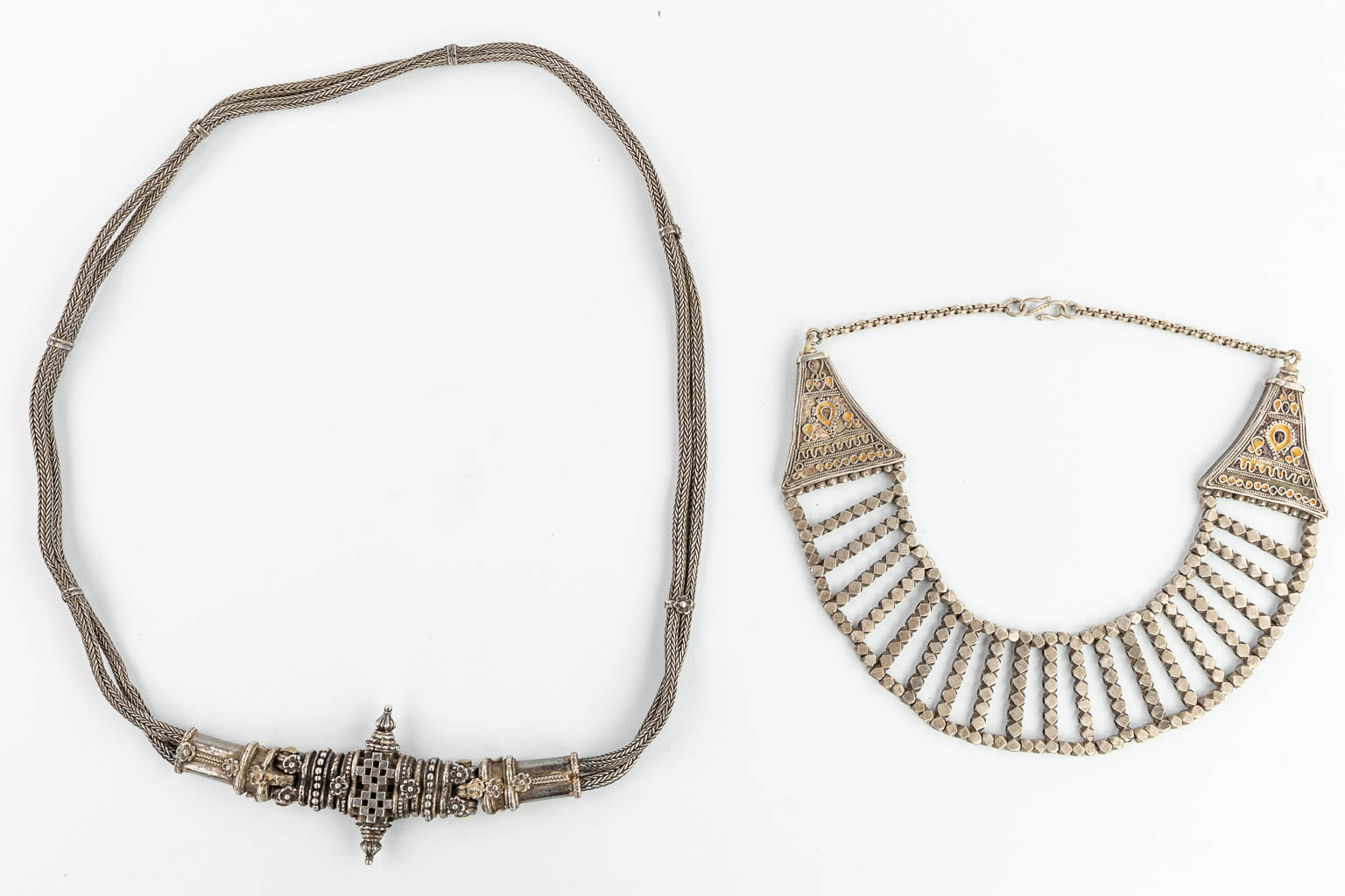 A necklace and belt made of silver in Oriental style. 