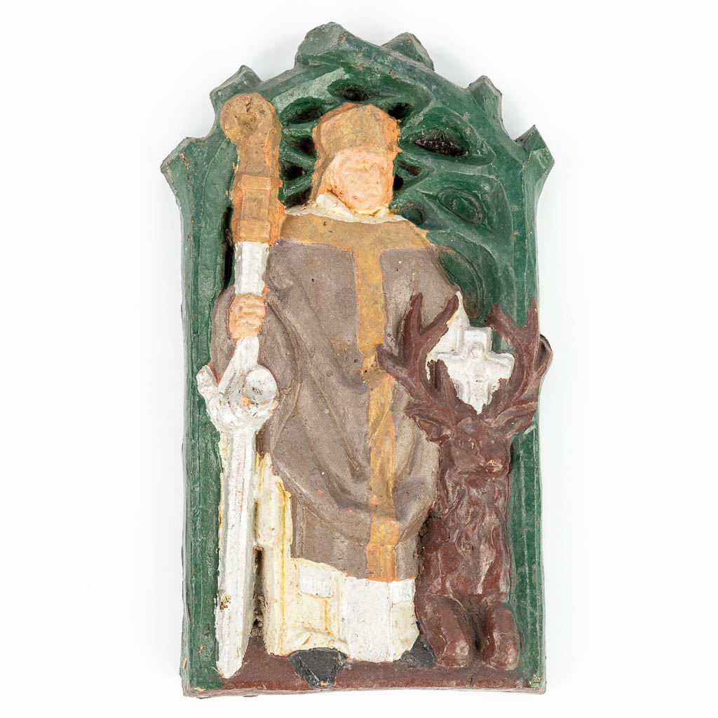 Een plaquette gemaakt uit terracotta van 'Heilige Hubertus' (H:29cm)